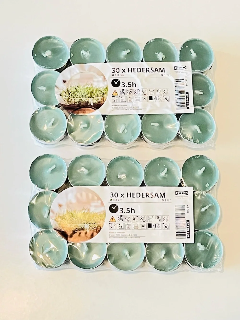 Lot of 2 IKEA HEDERSAM Scented Green Tealight Candles Grass Herbs RETIRED